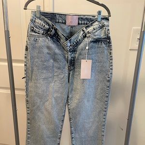 Brand new acid washed Revice denim size 30 never worn tags attached.